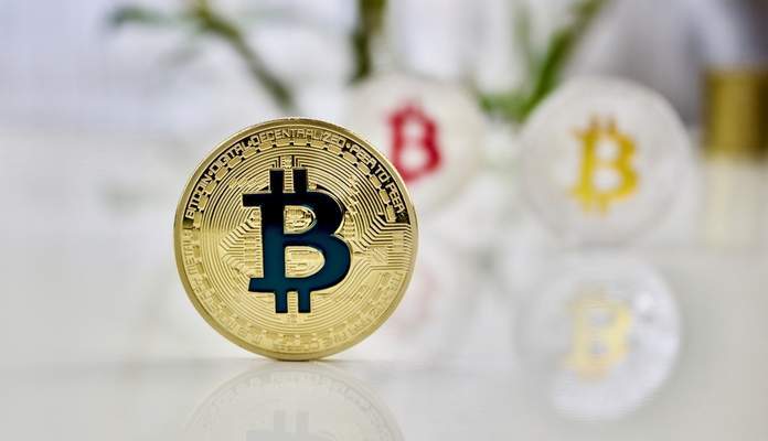 Imagem da matéria: Bitcoin e criptomoedas recuam após forte alta