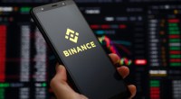 Celular com logotipo da BInance