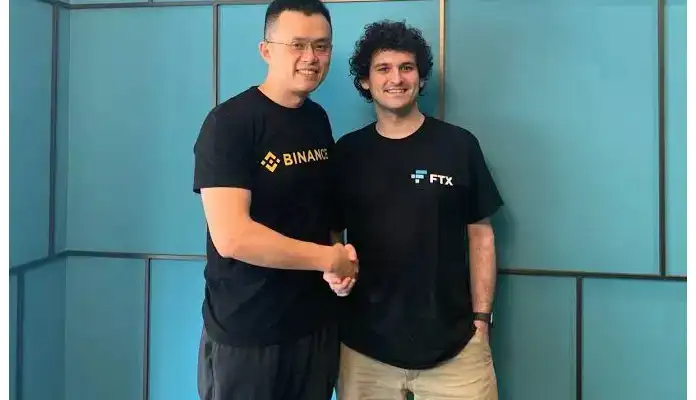 CEO da Binance CZ e ex CEO da FTX SBF posam para foto -Reprodução-Twitter