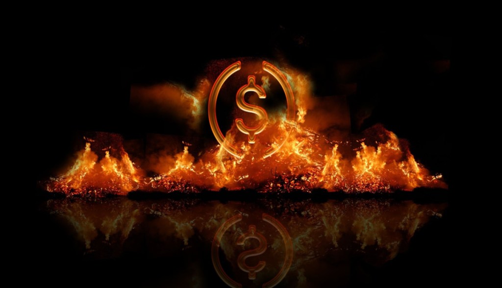 simbolo da usd coin USDC em chamas