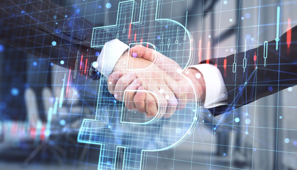 Imagem da matéria: Corretoras anunciam fusão e criam nova gigante das criptomoedas