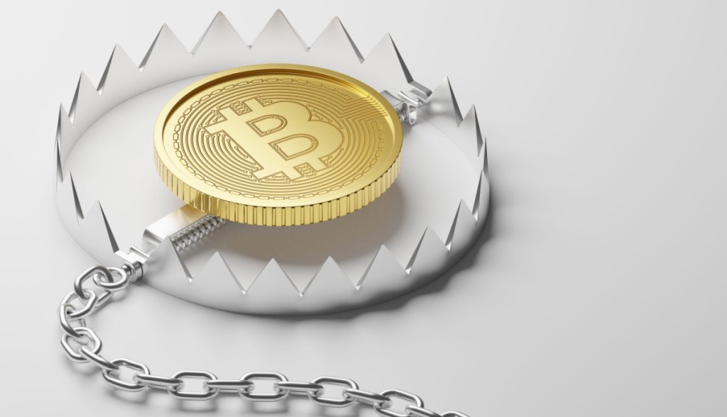 moeda de bitcoin dentro de armadilha selvagem